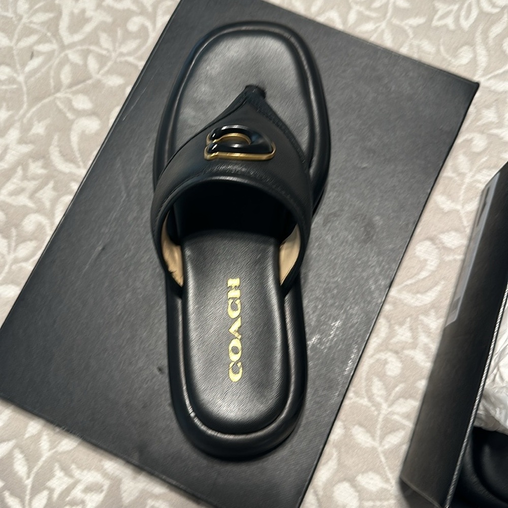 New in the box . Coach sandals